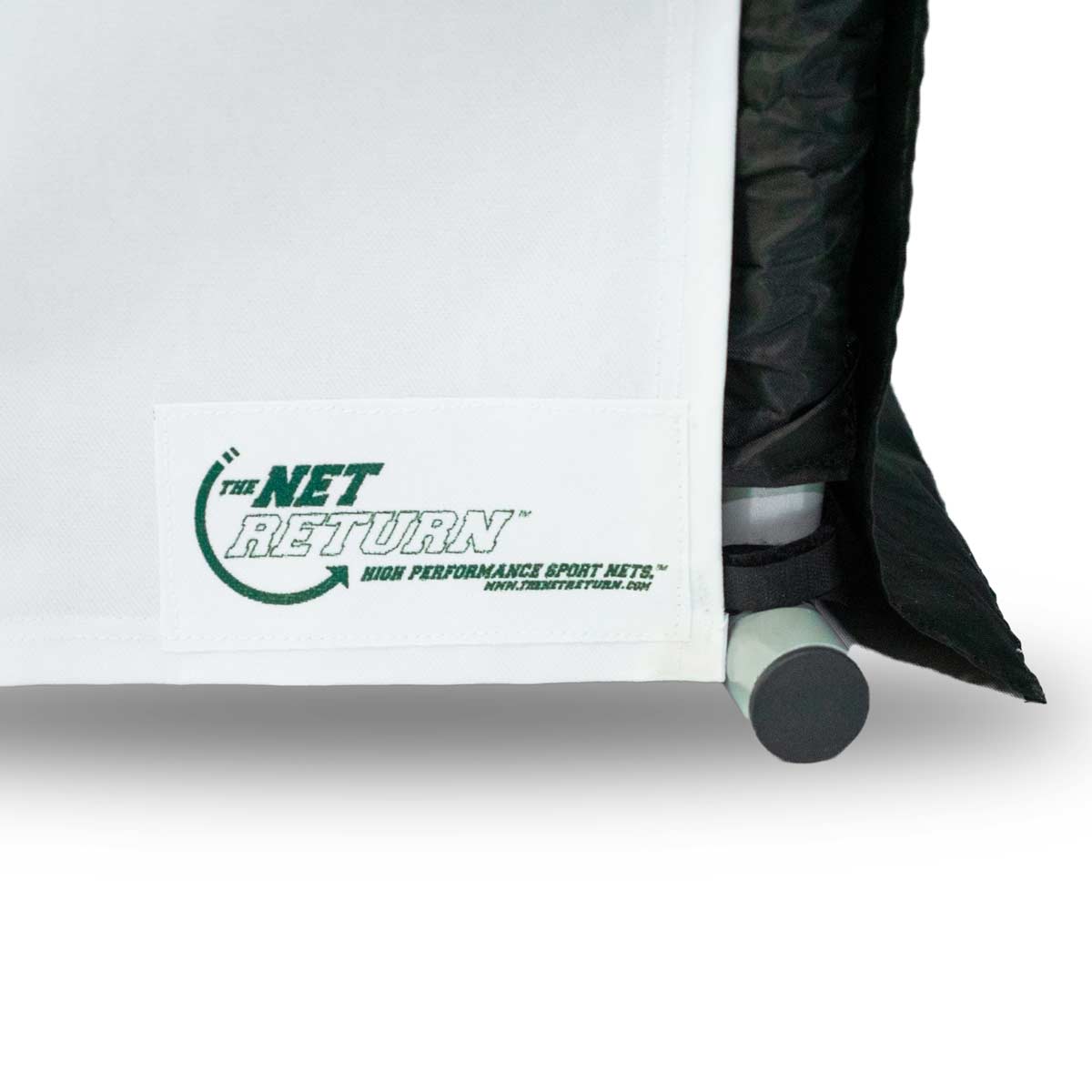 Close-up of The Net Return Simulator Kit fabric panel with logo and website, attached to a black frame—ideal for any home golf simulator or garage setup.