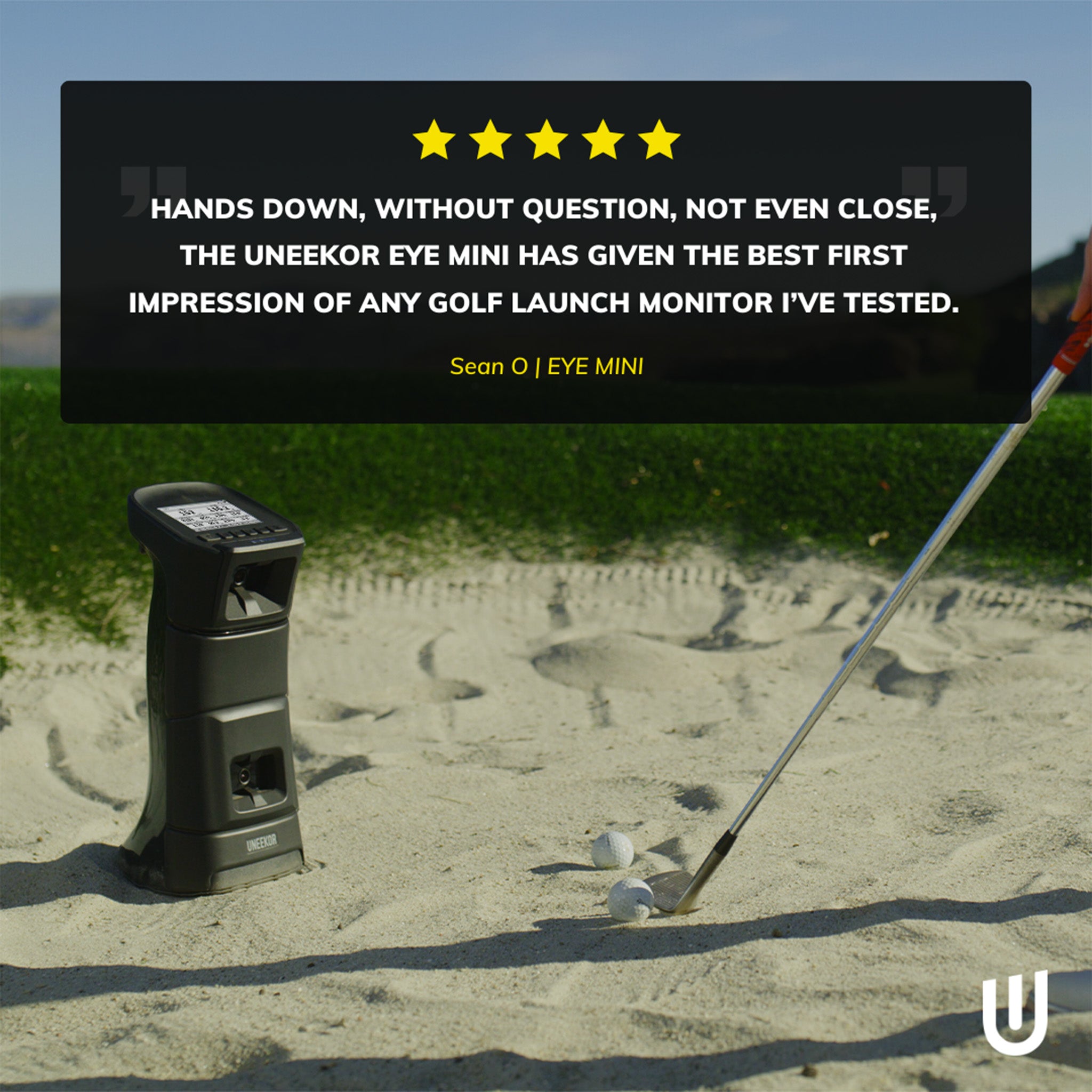 A golf club and balls are in the sand next to a golf launch monitor. A testimonial about the Uneekor Eye Mini launch monitor is displayed above.