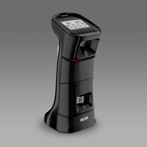 A sleek, black electronic device with a digital display and buttons, standing upright against a gray background. The brand name "UNEEDA" is visible near the base.