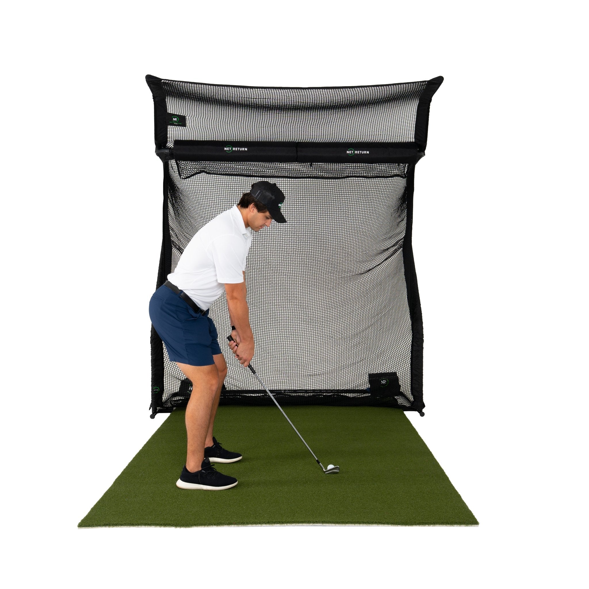 The Net Return Home Series golf net with the No Fly Zone and turf, front view (lifestyle)