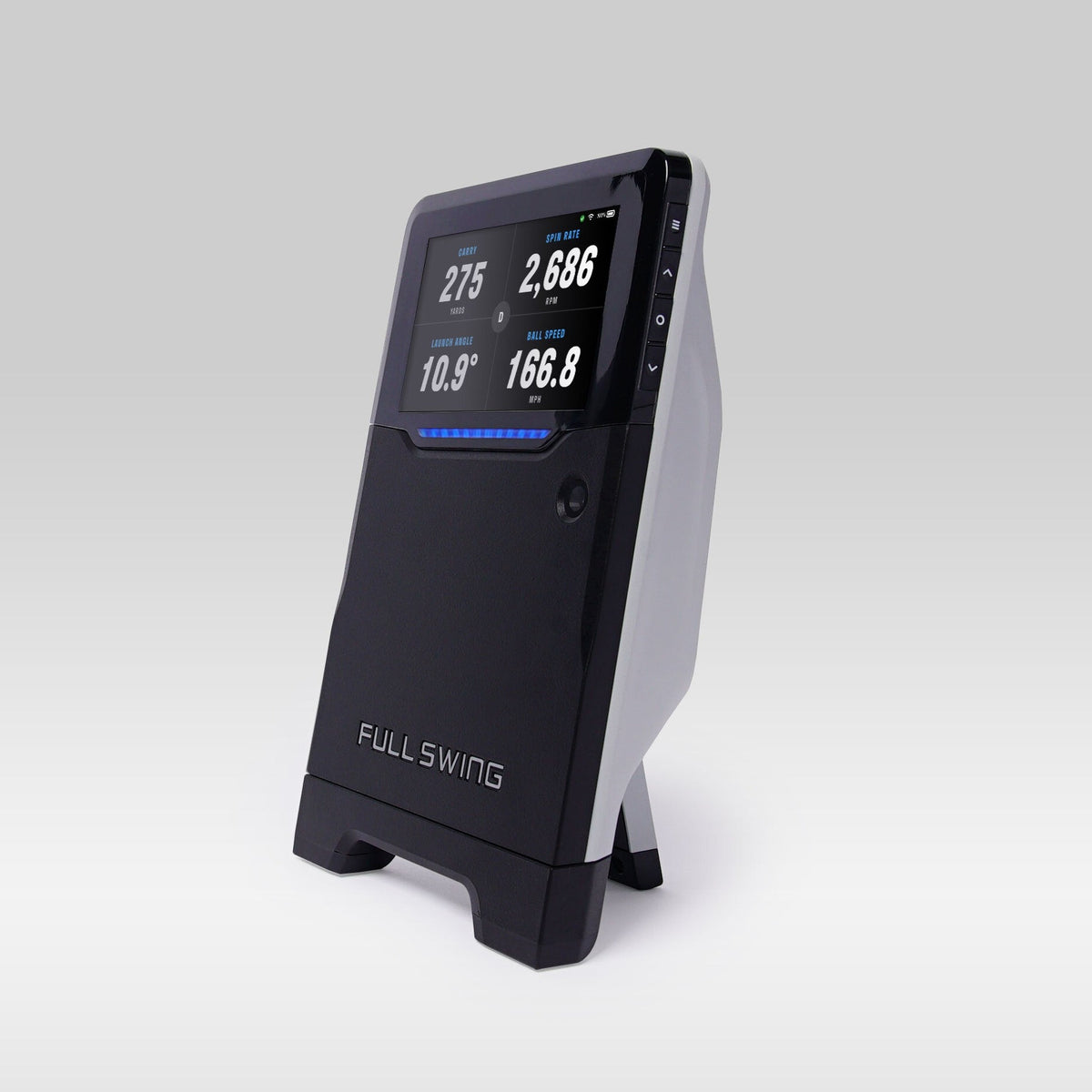 The Full Swing KIT, a black and white golf launch monitor by Full Swing, uses radar technology to display swing data like yards, degrees, and speed on its screen.