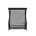 Black indoor golf hitting net with a sturdy frame, featuring a mesh design for practice and training.