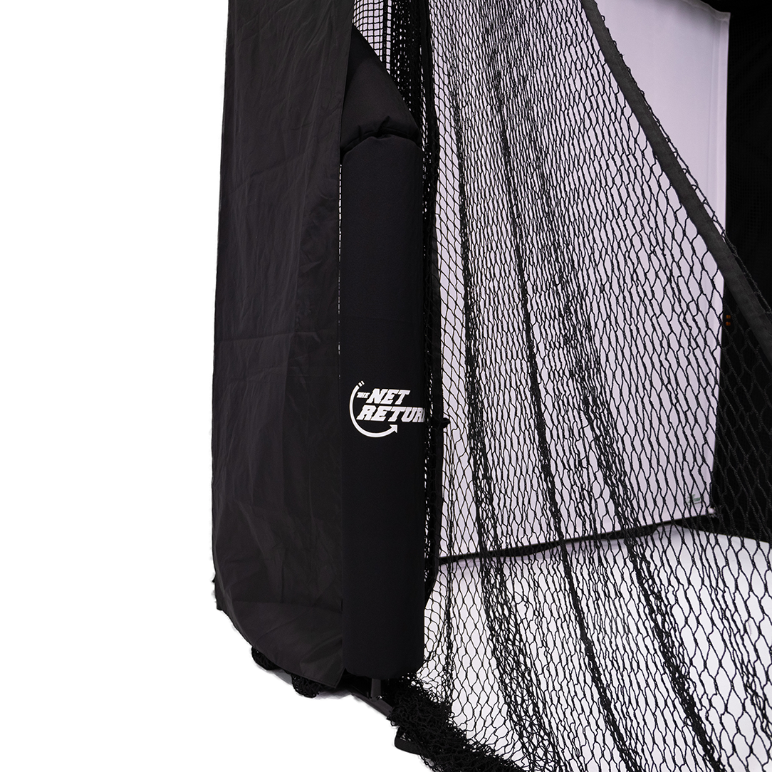 A black sports net with a white "Net Return" logo, partially draped with black fabric, stands against a plain backdrop.