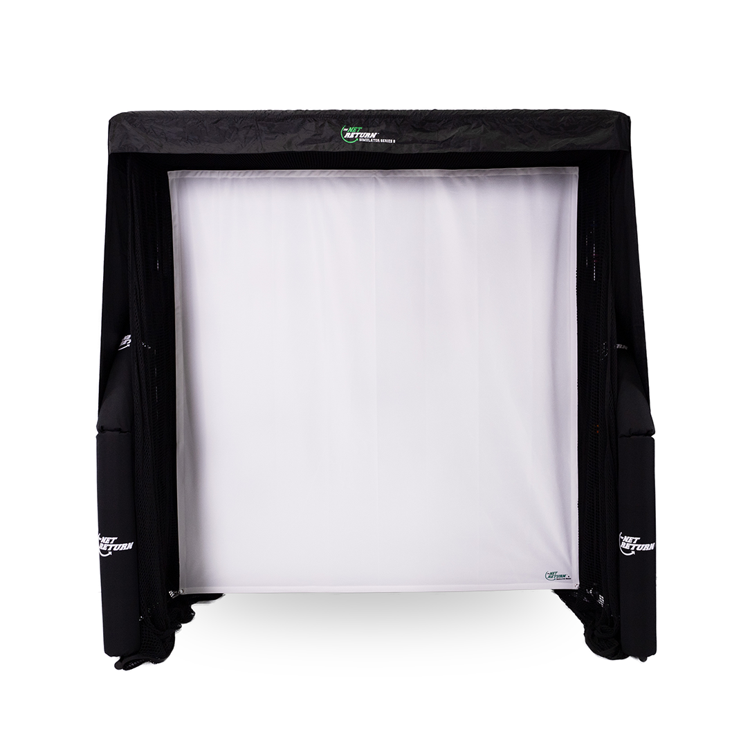 A black and white sports net is set up, designed for indoor use. It has a white mesh backdrop and is surrounded by a black frame.