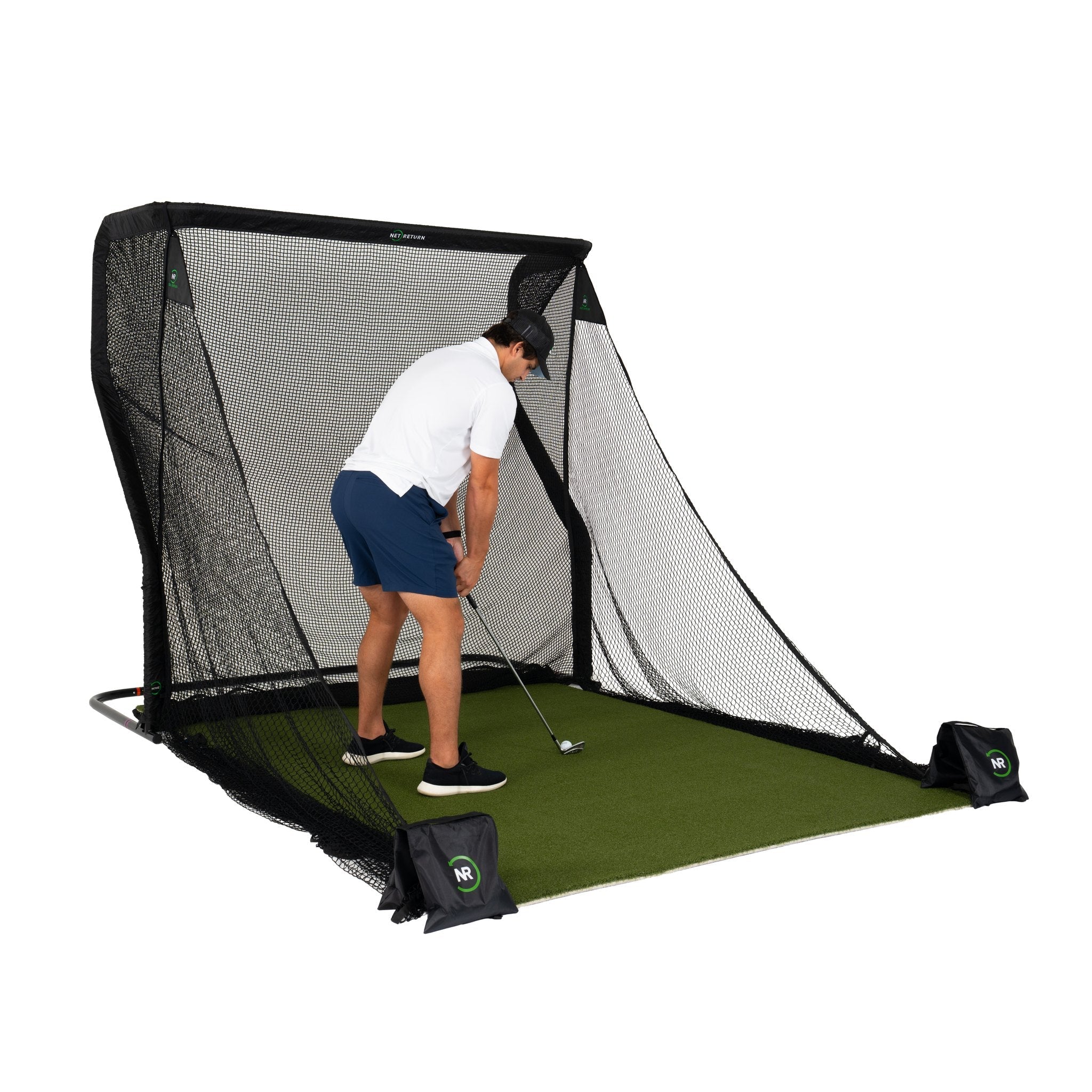 The Net Return Home Series golf net with turf and side barriers, angled view (lifestyle)