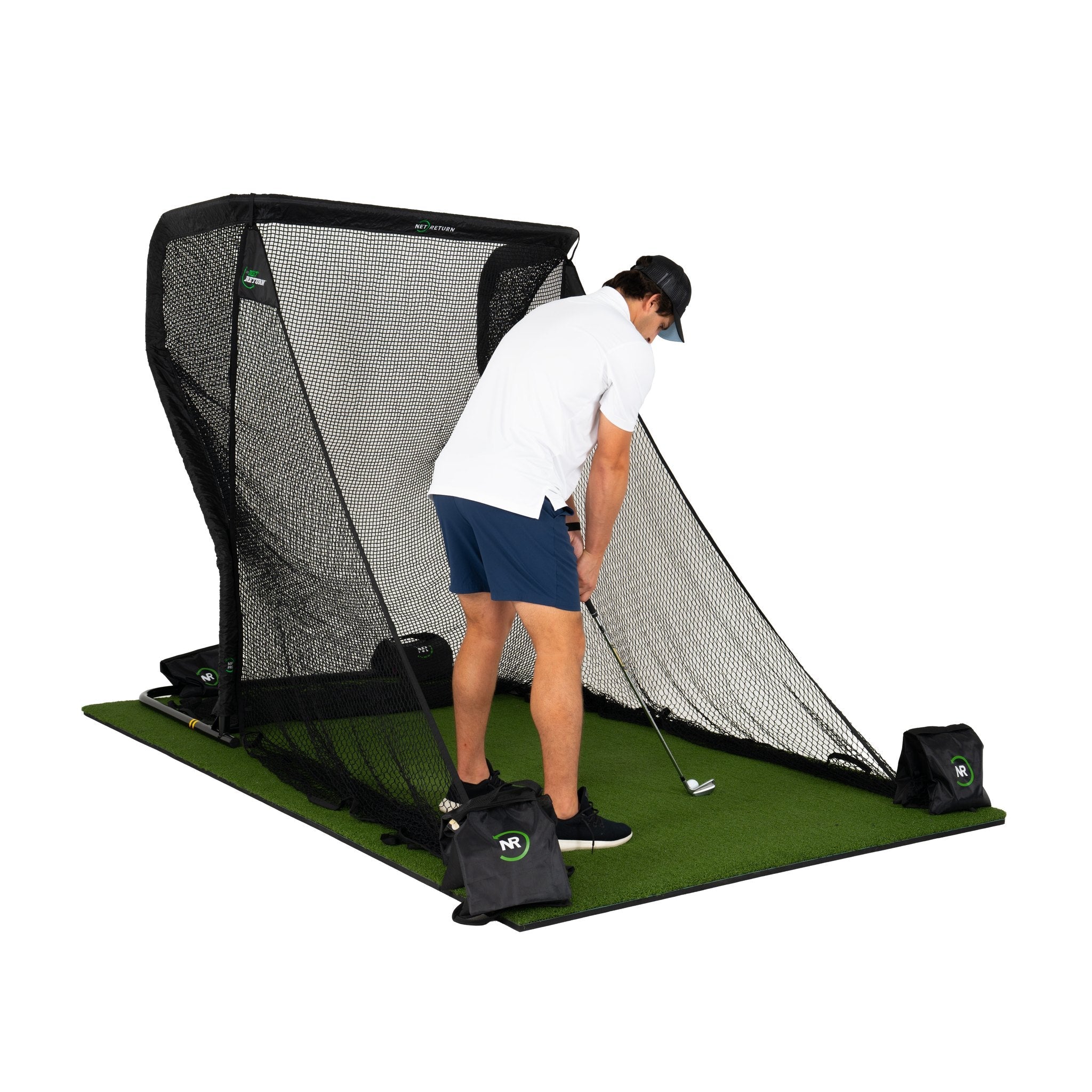 The Net Return Mini Pro golf net with side barriers and turf, angled view (lifestyle)