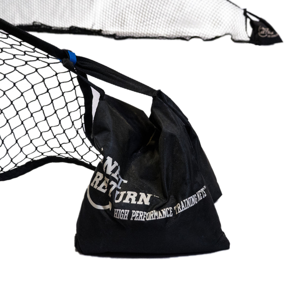 Black sports net with white text reading â€œNET RETURN HIGH PERFORMANCE TRAINING NETSâ€ on the side.