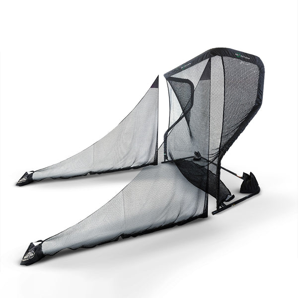 A large black mesh golf ball collector, designed to capture and store golf balls during practice.